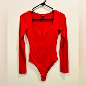 Women’s red long sleeve V-neck cotton body suit size XS